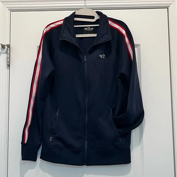 Hollister Unisex Jacket Navy Blue with Red and White Stripes on Arms Size Small. - Picture 2 of 5